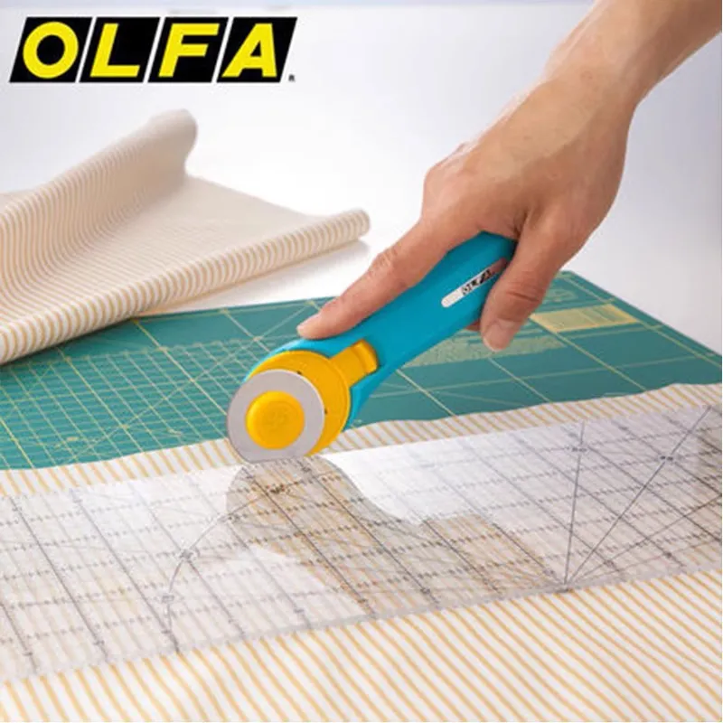 Olfa RTY-2/C 45mm Rotary Pinkl - огляд і ціна Rotary Cutter For Fabric 45Mm
